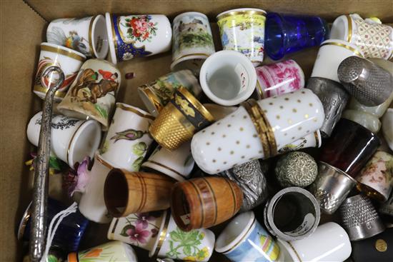 Five thimble display domes and a collection of ceramic, treen and other thimbles,